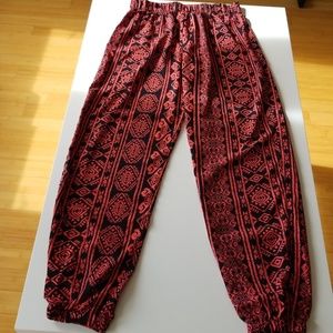 Red and black print patterned pants